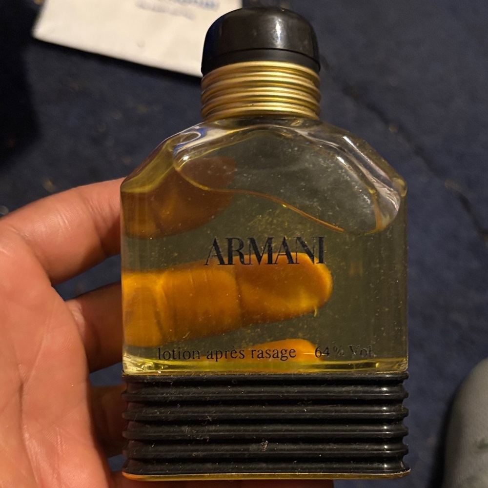 Giorgio Armani Men's Moisturizer Bottle in Black and Gold vintage bottle